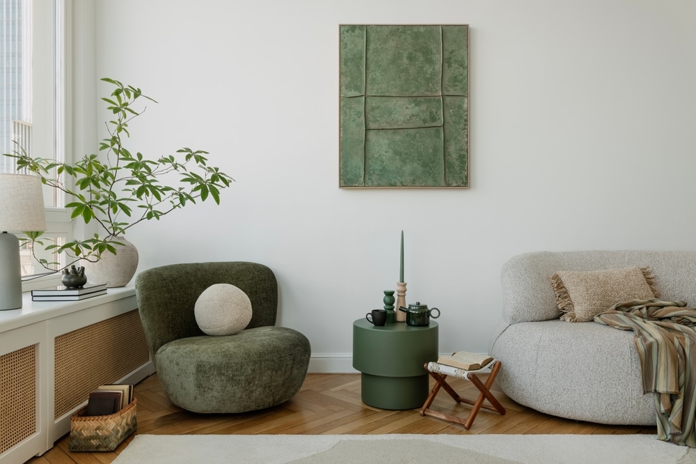 Beautiful minimalist room with natural moss tones and stone colors, plant and wall art
